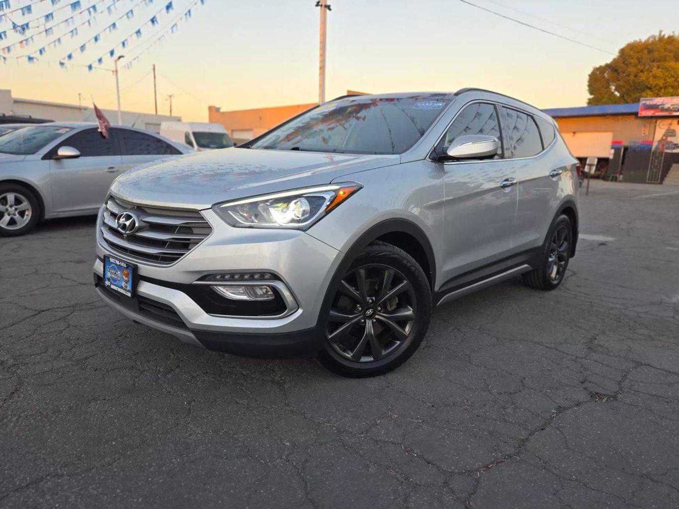 HYUNDAI SANTA FE SPORT 2018 5XYZWDLA6JG550431 image